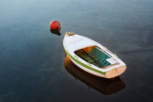 istock Rowing boat to the buoy in the harbor 481962642