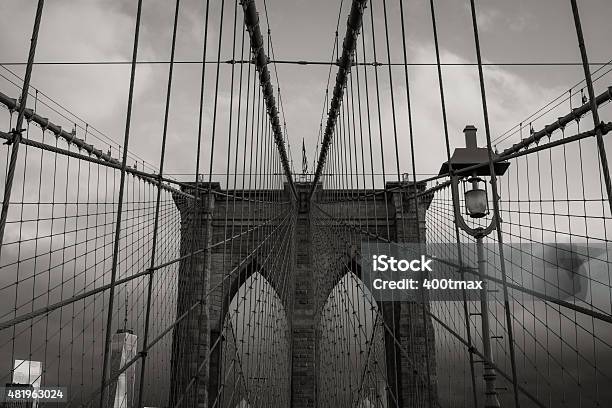 Monochromatic Brooklyn Bridge Stock Photo - Download Image Now - 2015, American Flag, Arch - Architectural Feature