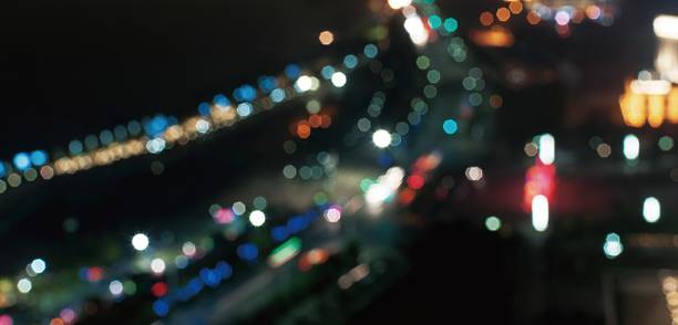 istock Photo of bokeh lights on black background 481967734