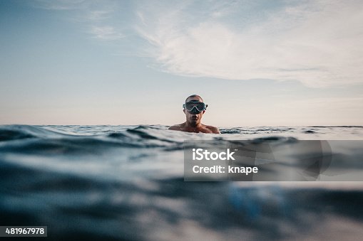 istock Man swimming in sea with scuba mask 481967978