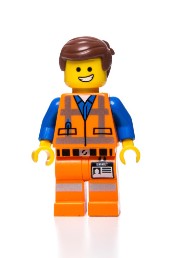 Miami, USA - March 15, 2014: Emmet Lego Movie mini figure character. Lego brand is owned by The LEGO Group.
