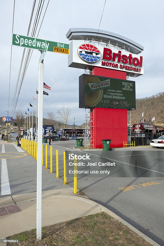 Bristol Motor Speedway Bristol, Tennessee, USA - March 14, 2014: Sign for Bristol Motor Speedway during NASCAR race weekend in Bristol, Tennessee. People are visible in the background. Bristol - Virginia Stock Photo