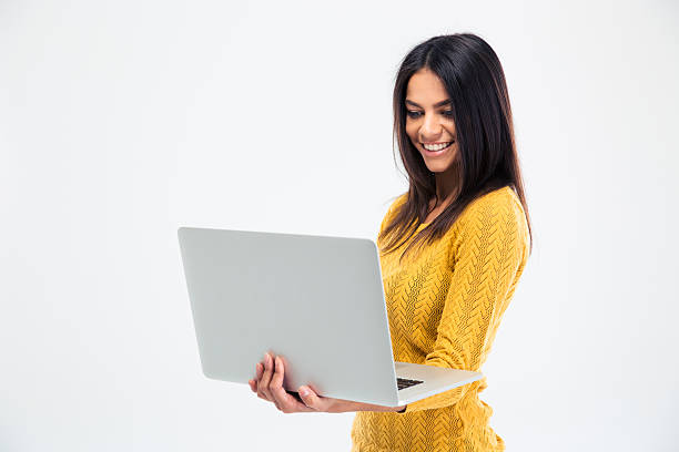 istock Happy beautiful woman using laptop 481968692