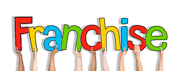 istock Diverse Hands Holding the Word Franchise 481969114