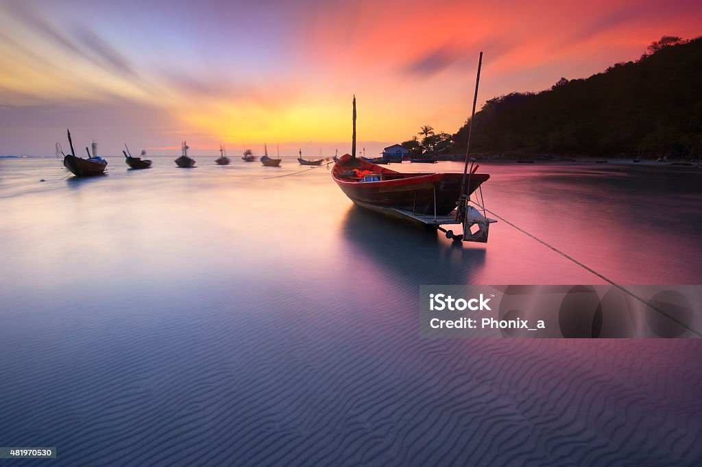 Fishing boats seaside  beach during sunset 2015 Stock Photo