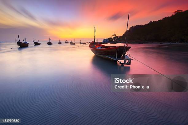 Fishing Boats Seaside Beach During Sunset Stock Photo - Download Image Now - 2015, Adult, Bay of Water
