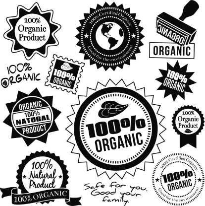 Vector seals and labels with a 100% organic food theme.