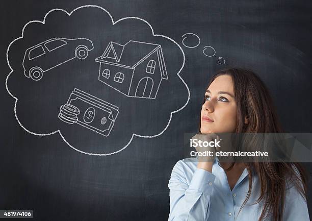 Young Woman With Her Dreams Stock Photo - Download Image Now - Day Dreaming, Dreamlike, Savings