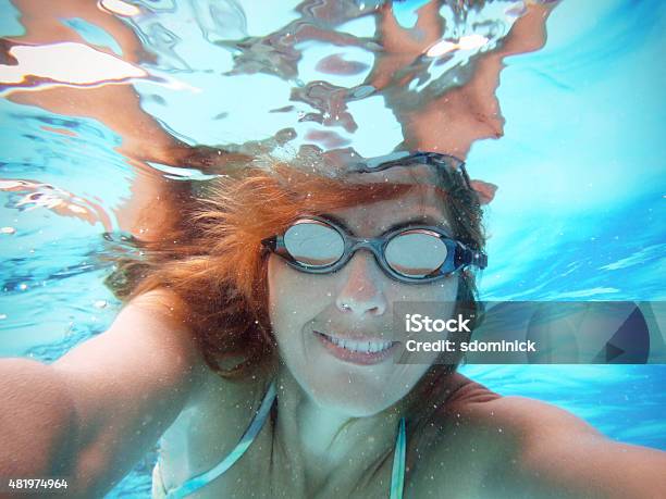 Smiling Woman Taking Selfie Underwater In Pool Stock Photo - Download Image Now - One Woman Only, Selfie, Underwater