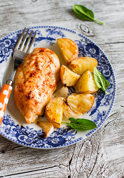 istock chicken breast baked with potatoes 481977890