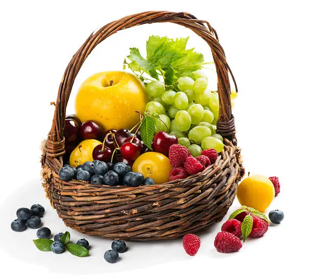 Photo of Assortment of fruits and berries in a basket