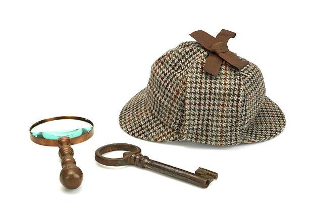 istock Detective Deerstalker Cap, Vintage Magnifying Glass And Old Key 481981368