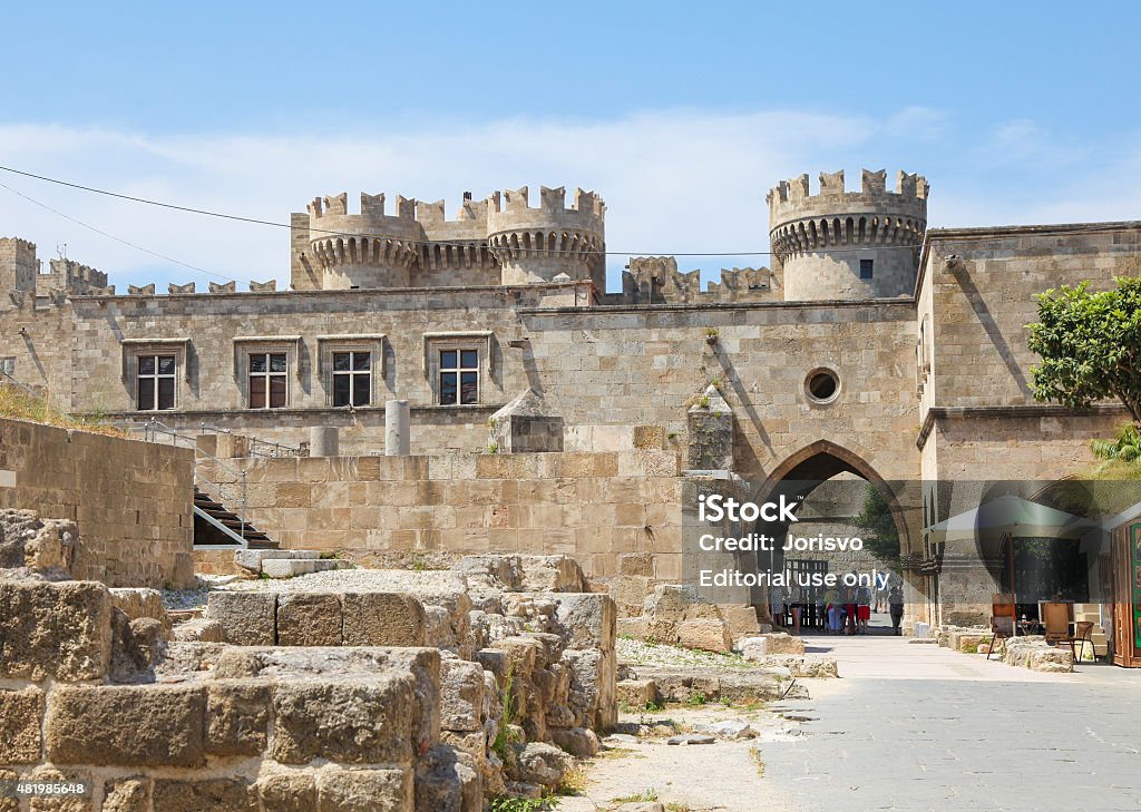 Palace of the Grand Master of the Knights of Rhodes Rhodes, Greece - June 7, 2015: Unidentified people at the Palace of the Grand Master of the Knights of Rhodes, a medieval castle of the Hospitaller Knights on the island of Rhodes, Greece. 2015 Stock Photo