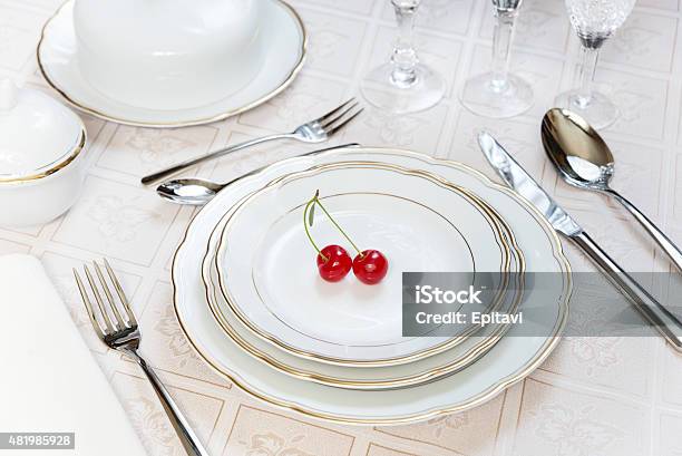 Two Cherries Lie On A White Porcelain Plate Stock Photo - Download Image Now - 2015, Anticipation, Arranging