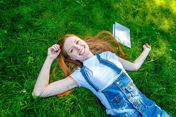 istock Beautiful smiling red-haired young woman 481986646