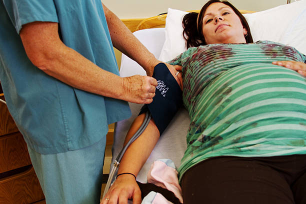 istock Nurse taking pregnant Mom's blood pressure 481989077