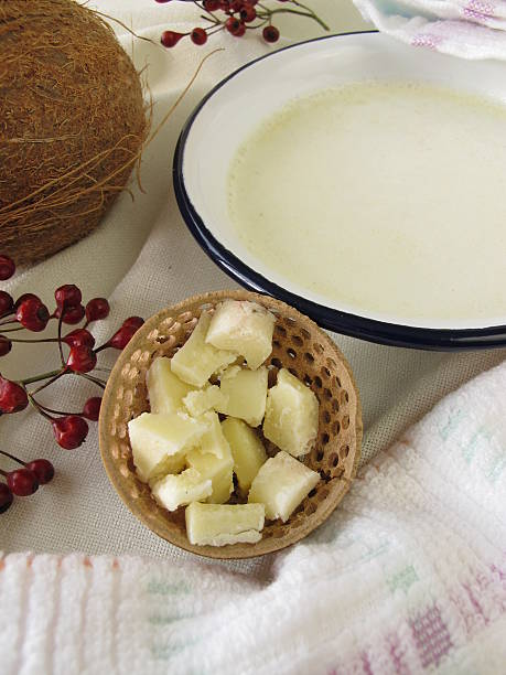 Relaxing coconut bath Relaxing coconut bath  - Entspannendes Kokosbad palmin photos stock pictures, royalty-free photos & images