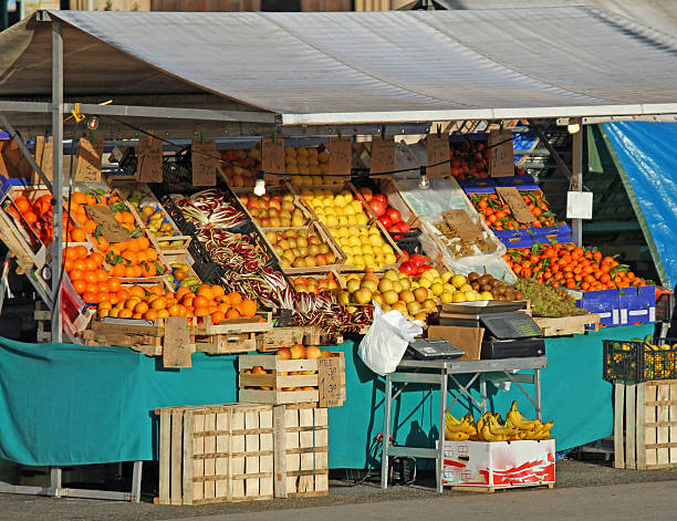 seasonal fruits and vegetables for sale in the fruit and vegetable stall at fruit market