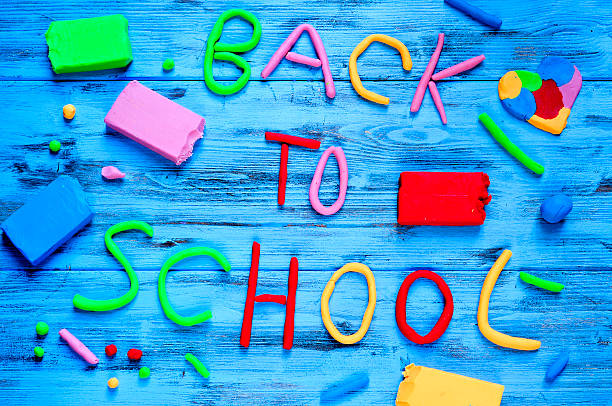 istock back to school written with modelling clay of different colors 481990078