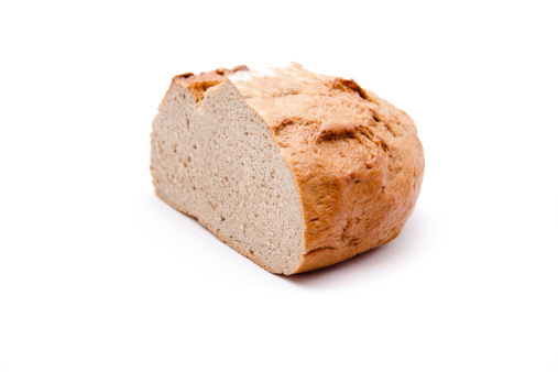 Wheat bread halves on white background