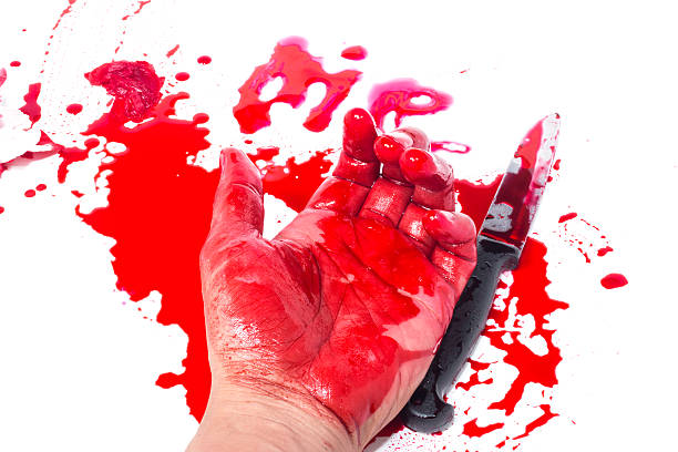 istock Dead hand with blood and knife 481991704