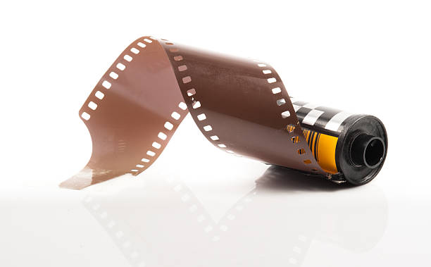 35mm film rolls 35mm film rolls 35mm movie camera stock pictures, royalty-free photos & images