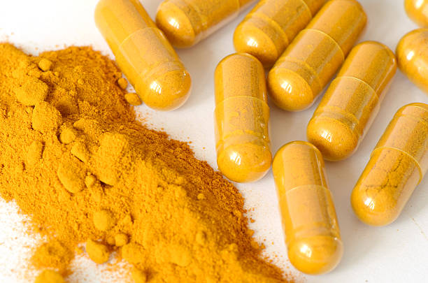 istock Tumeric powder and herbal medicine products. 481994939