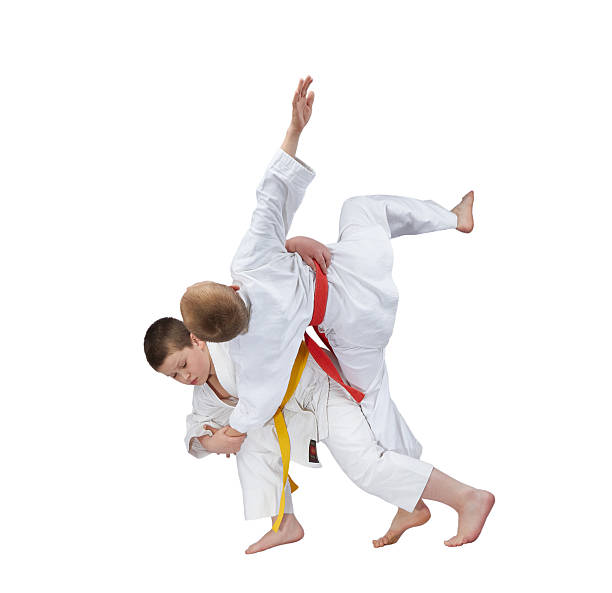 istock High throw in perfoming athlete with a yellow belt 481995476