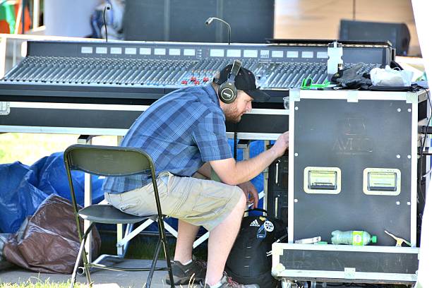 Sound Check Littleton, CO, USA - July 11, 2015: Sound Technician doing a sound check at the Colorado Irish Festival showtime stock pictures, royalty-free photos & images