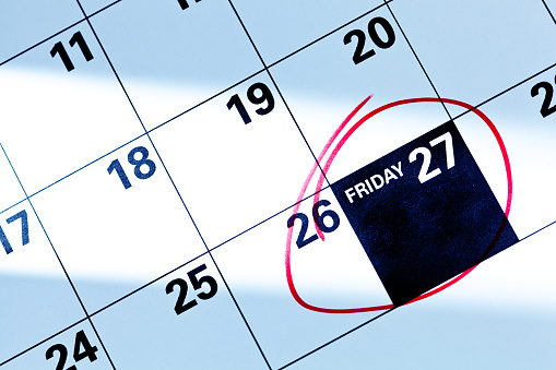 Black Friday Sale date marked on a calendar, November 27 Friday, 2015. The traditional Friday after Thanksgiving date is the kick off date for retailers for Christmas retail, the biggest Christmas shopping date of the holiday season. Close-up photography in horizontal format of a calendar page.