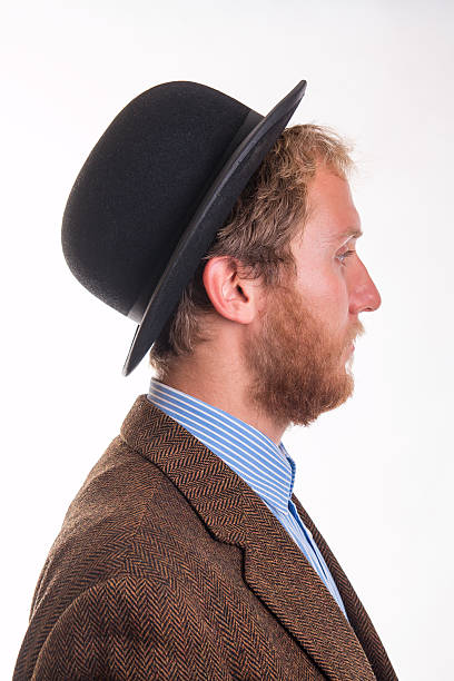 istock Profile of a bearded man in an old-fashioned Victorian bowler 482000736