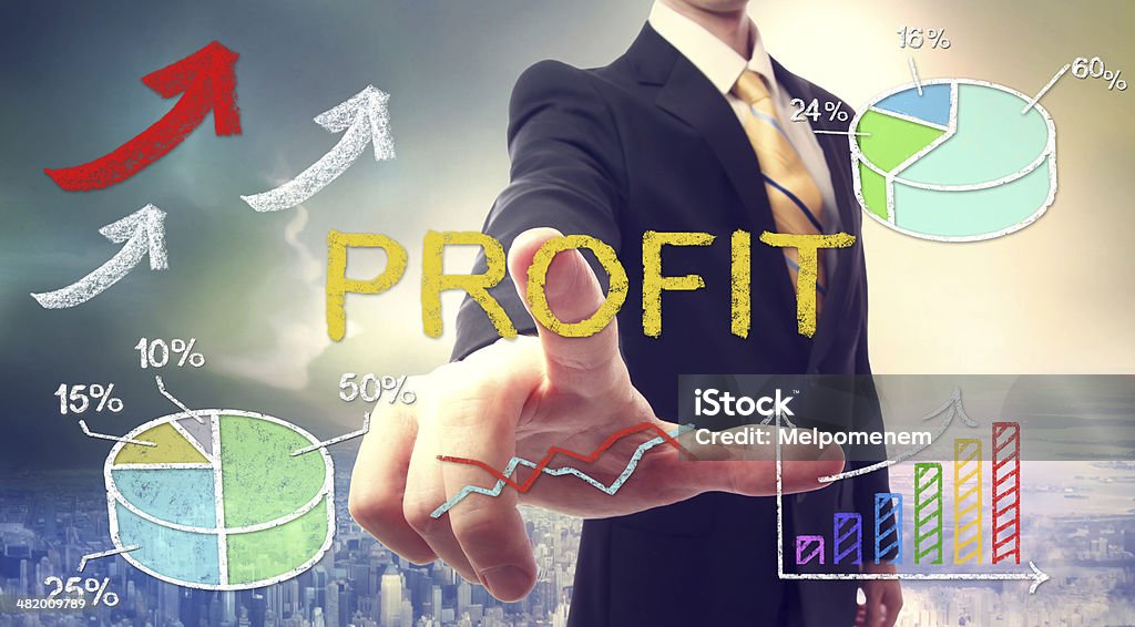 Business man pointing PROFIT Business man pointing PROFIT with colorful graphs Adult Stock Photo