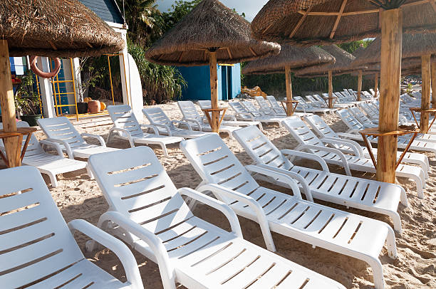 istock Sunbeds and umbrellas on the beach 482010864