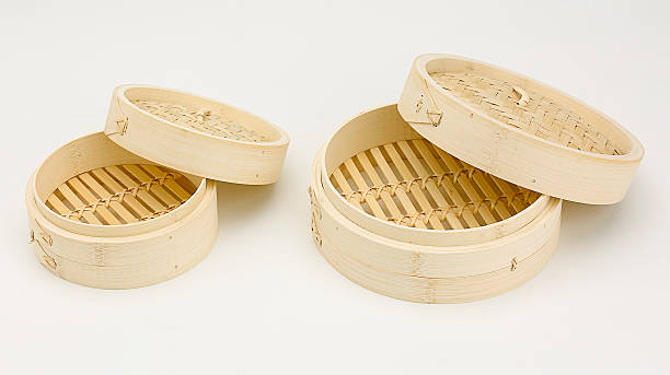 istock Bamboo basket for steaming Chinese or Japanese food isolated 482014120