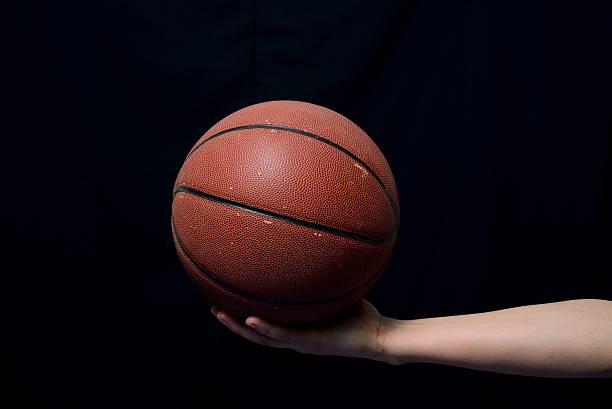 istock Basketball ball in male hands 482015363