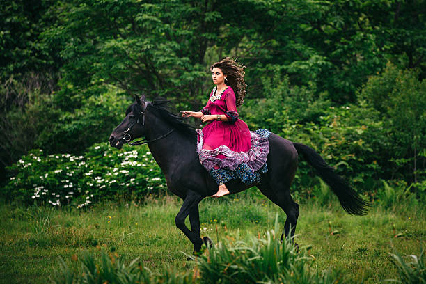 istock Beautiful woman on a horse 482015772