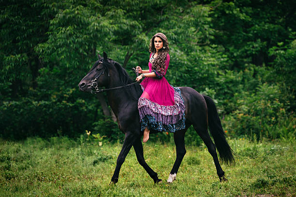 istock Beautiful woman on a horse 482015786