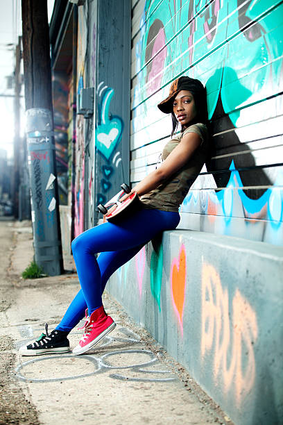 istock Young Woman With Skateboard 482017815