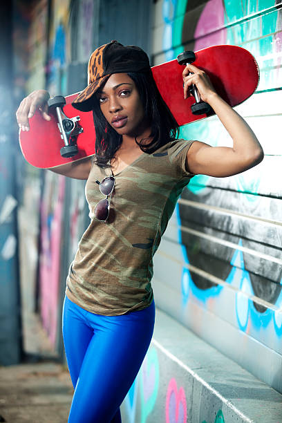 istock Young Woman With Skateboard 482017843