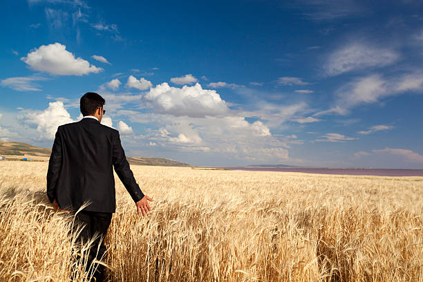 istock hand of a young man in the field 482018502