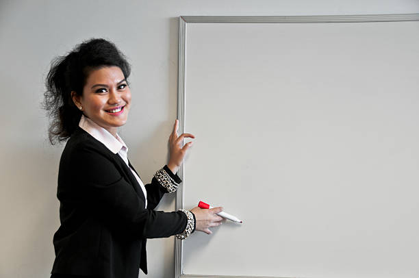 istock Business woman present with draw board on white background 482021830