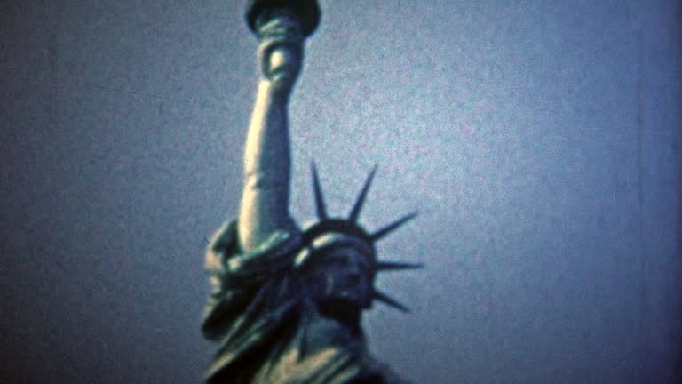 NEW YORK CITY - 1954: Statue of Liberty and the New York City skyline view.