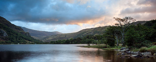 istock Panorama landscape stunning sunrise over lake with mountains 482024715