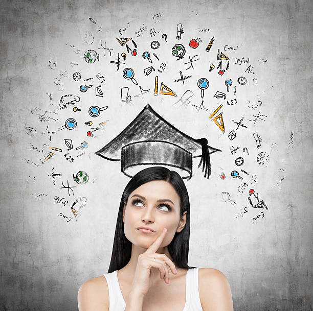 istock Young brunette lady is thinking about studying at the university. 482030380