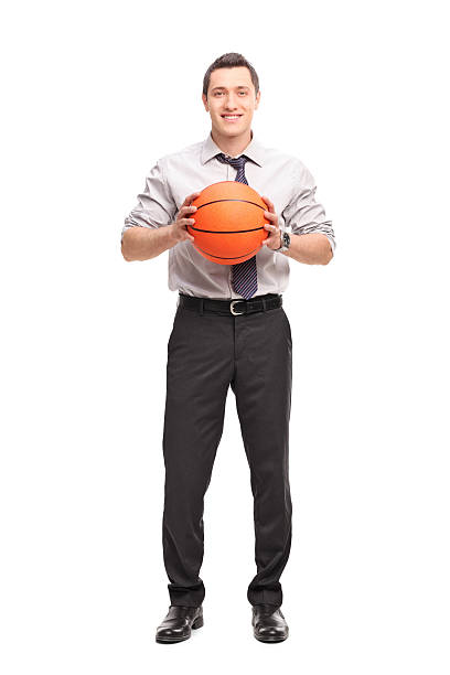 istock Young businessman holding a basketball 482030418