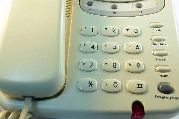 istock closeup Telephone number pad in white background 482031220