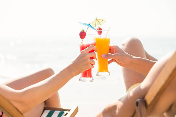 istock happy couple toasting a drink 482031454