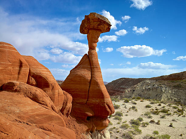 Balancing Rock Overlooking the Valley USA, Utah, Grand Staircase Escalante National Monument. Hoodoo at Toadstool formation. grand staircase escalante national monument stock pictures, royalty-free photos & images