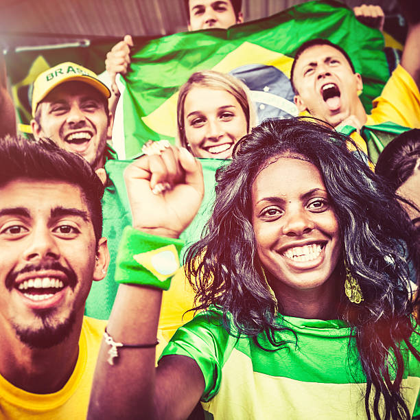 istock Brazil Fans Cheering at the Stadium 482032599