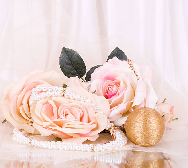 istock Vintage beads with roses on white background 482033329